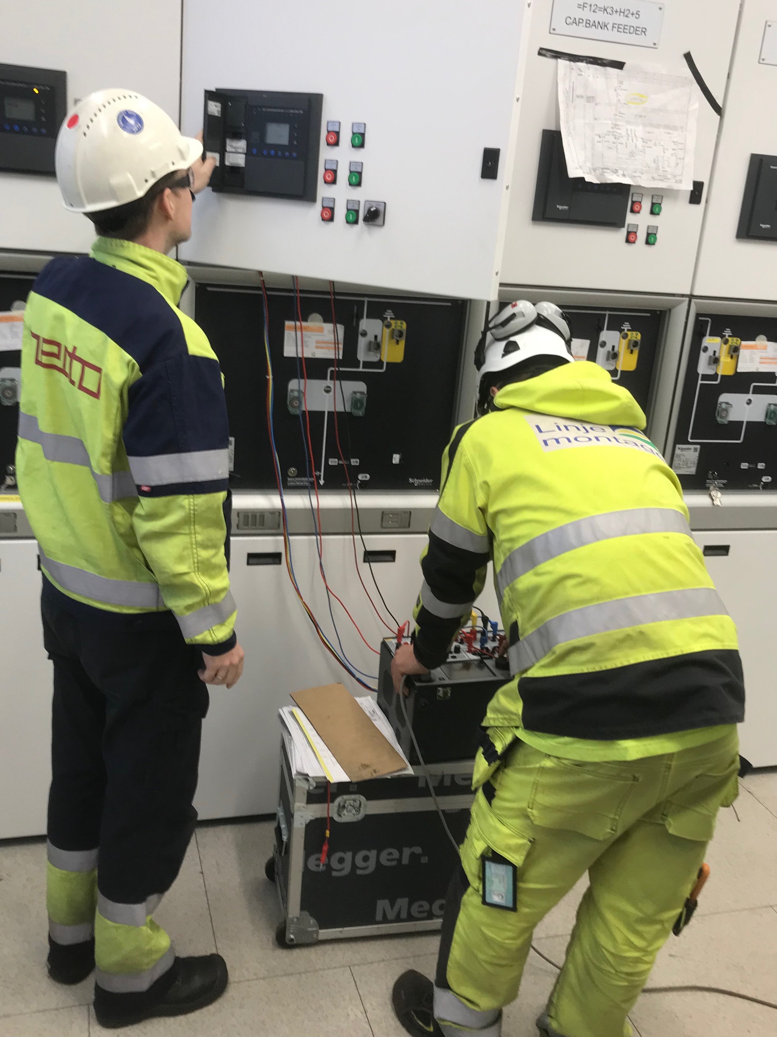 Engineers from Init and Linjemontage testing protection relays at Eramet Sauda